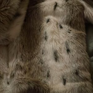 Reversible faux fur coat